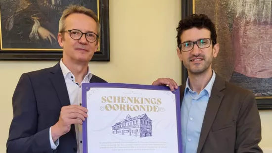 Stad Leuven draagt historische Universiteitshal over aan KU Leuven